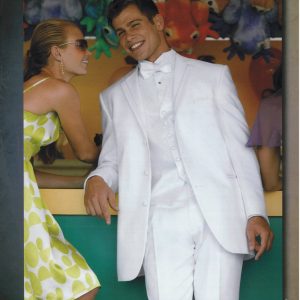 Man wearing white tuxedo with a woman in a yellow dress