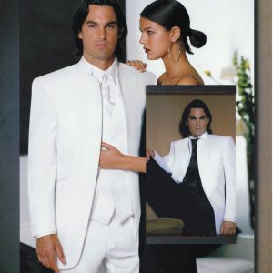 Man wearing white tuxedo with white vest and black vest