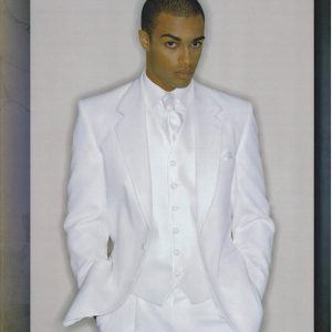 Young man wearing a white tuxedo